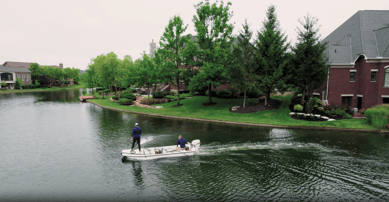 applicator treating pond