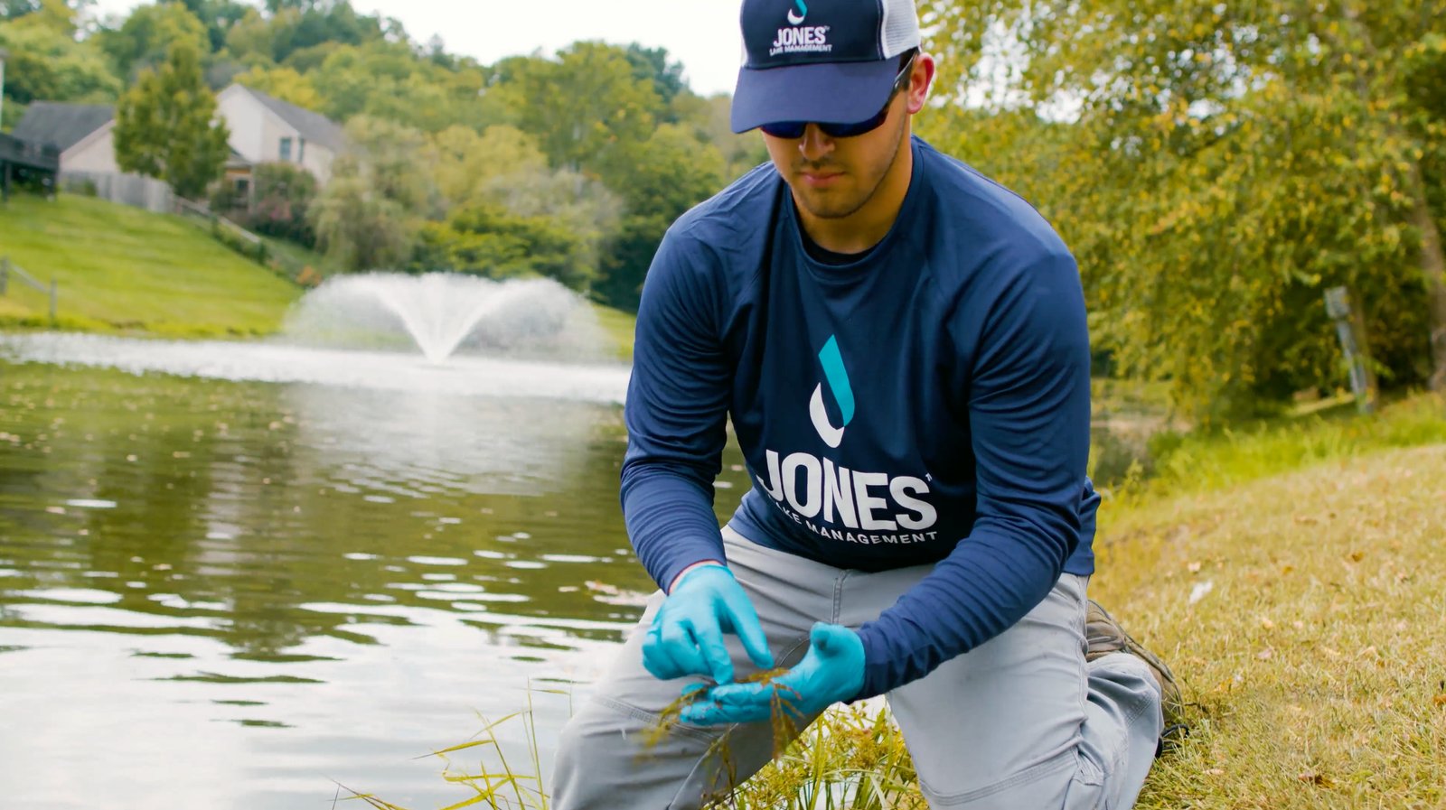 Employee Identifying Weeds
