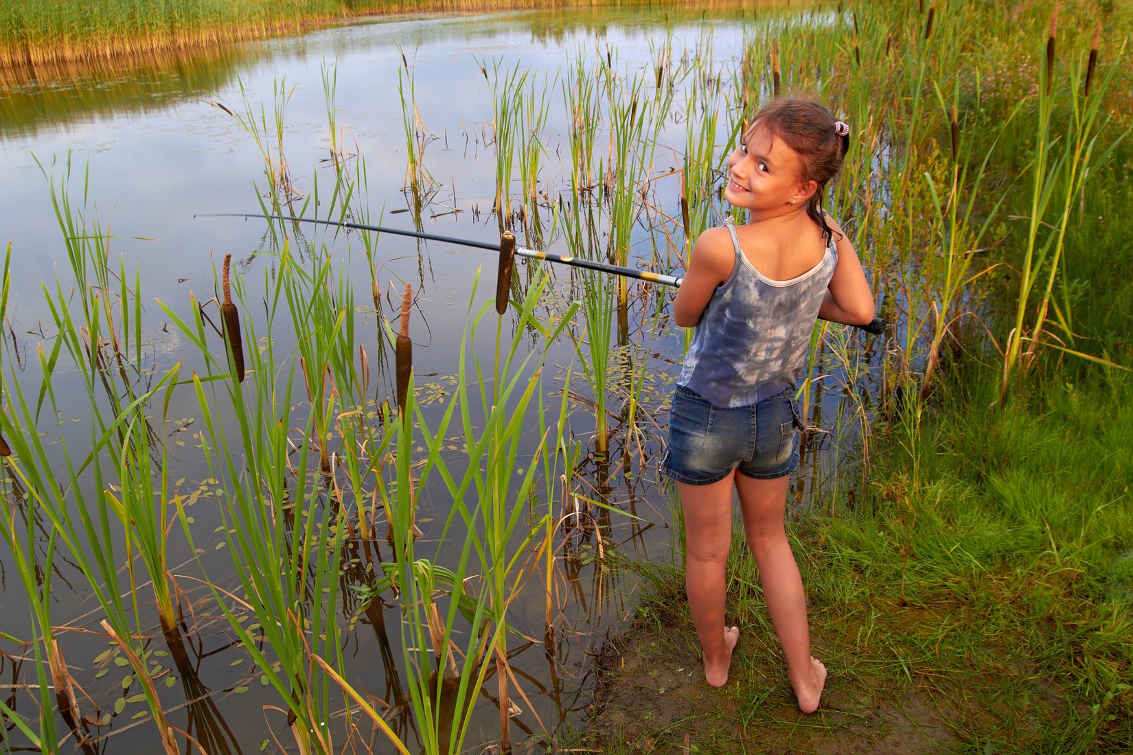 bigstock-pretty-young-girl-fishing-on-r-25328816